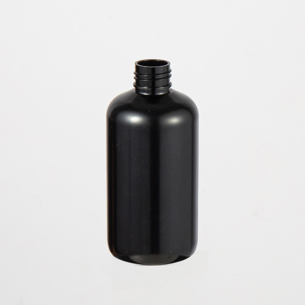 black round shoulder round bottle