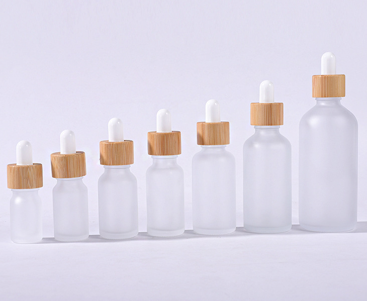small clear glass dropper bottle