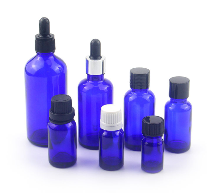 small blue glass dropper bottles